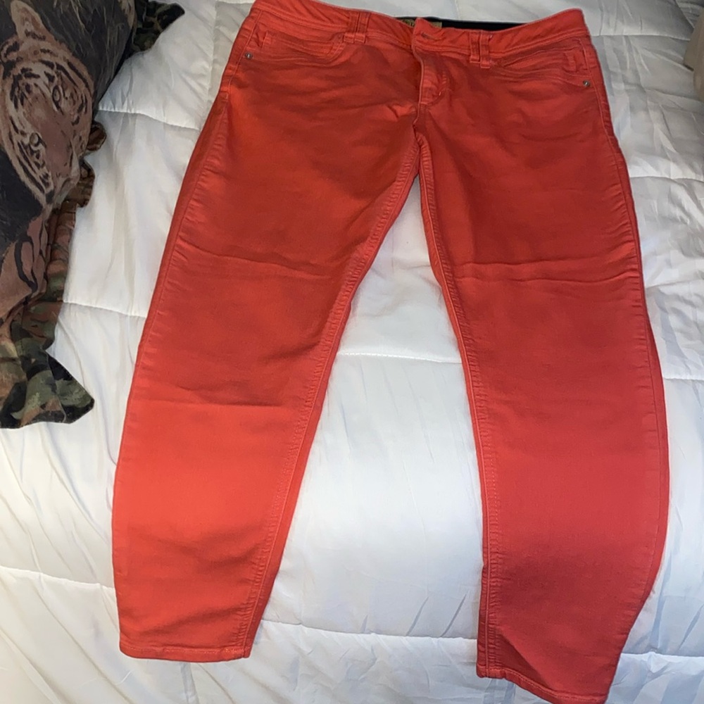 salmon color stretch jeans